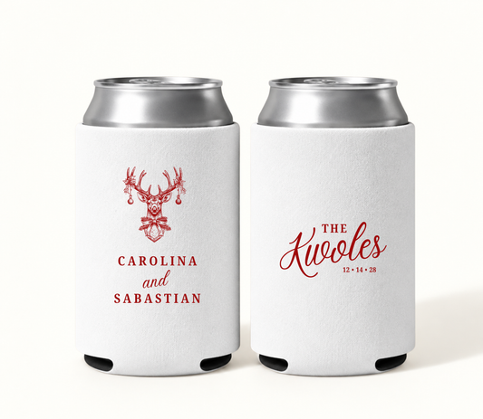 Personalized white Christmas reindeer wedding can coolers featuring red ornament-decorated deer artwork, Carolina and Sabastian names, The Kivoles surname, and wedding date 12.14.28.