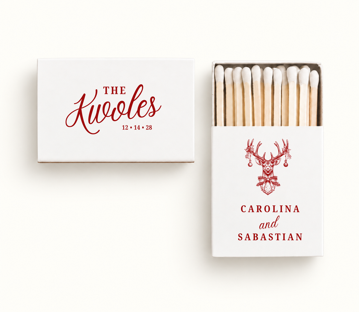 Personalized white Christmas wedding matchboxes featuring red deer illustration, The Krugles couple name design, and holiday wedding details.