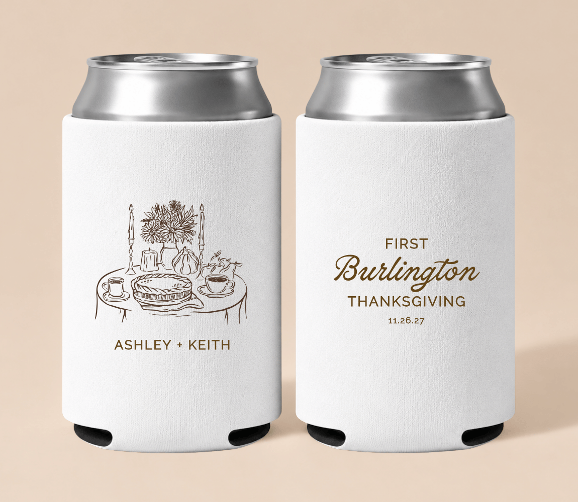Personalized white First Thanksgiving wedding can coolers featuring an elegant Thanksgiving table illustration, custom couple names, and wedding date.