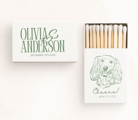 White personalized pet portrait wedding matchboxes featuring a custom dog illustration, elegant green typography, pet name, couple names, wedding date, and premium safety matches.
Personalized pet portrait wedding matchbox featuring a custom dog illustration, pet name, and elegant wedding typography.
Custom pet illustration wedding matchbox with couple names, wedding date, and premium safety matches.