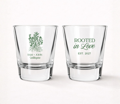 Personalized Rooted in Love wedding shot glasses featuring custom couple names, family name, established year, and a tree with roots illustration.