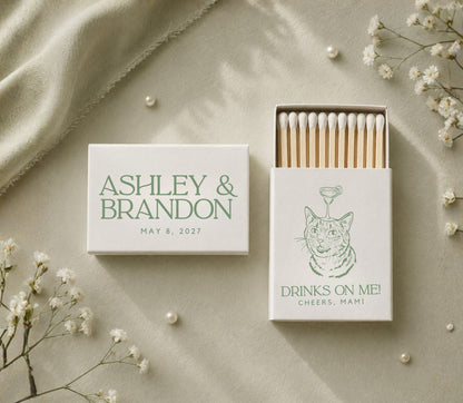 Custom cocktail cat wedding matchboxes featuring elegant serif typography, personalized pet artwork, and safety matches.