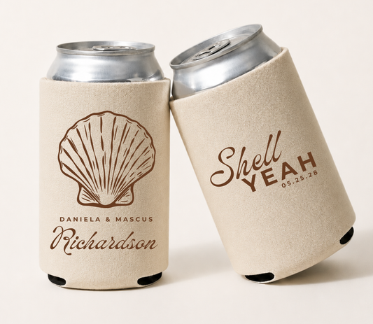 Personalized coastal wedding can coolers featuring a seashell illustration, custom couple's names, family name, wedding date, and beach-inspired design.