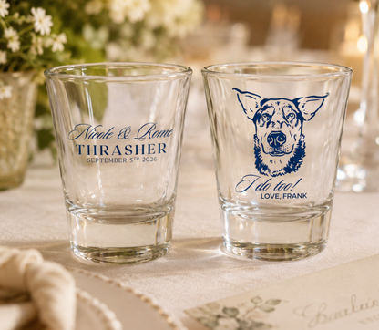 Personalized pet wedding favors featuring custom dog artwork on clear shot glasses for reception guests