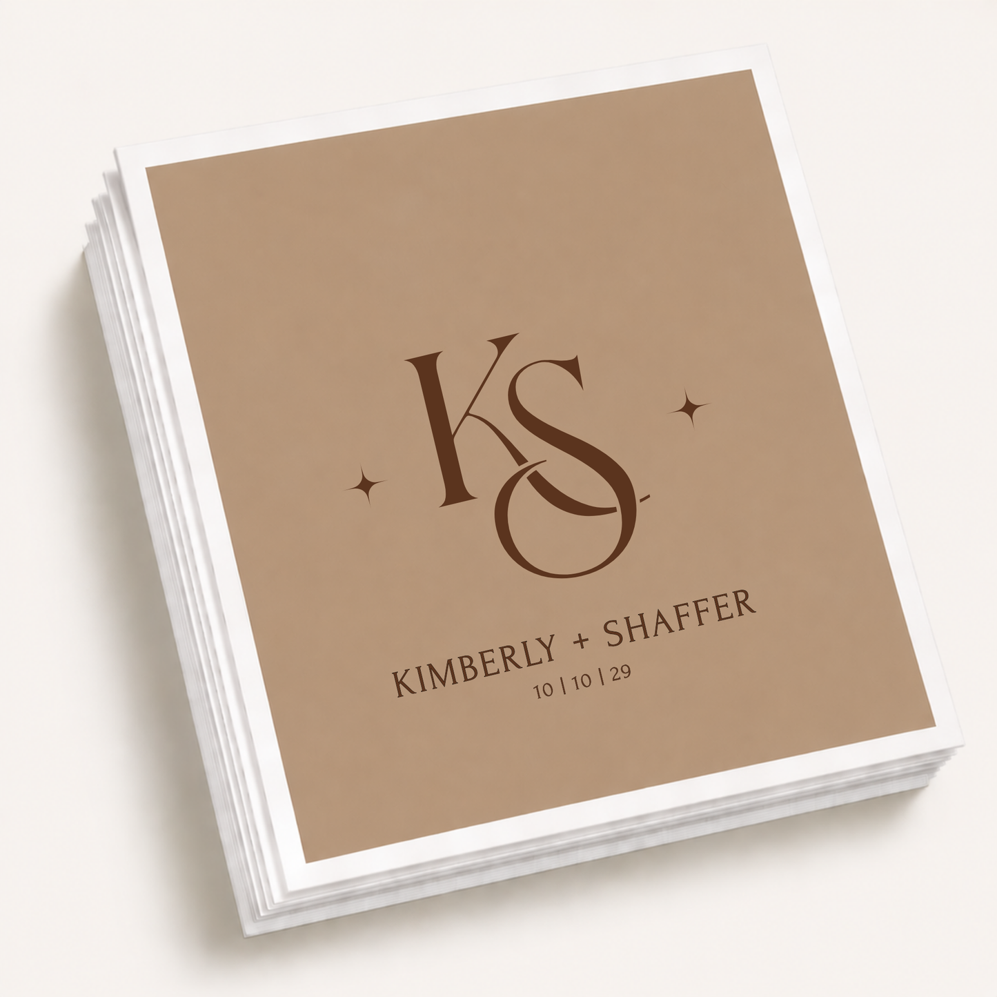 Personalized monogram wedding cocktail napkins featuring custom initials, couple names, and wedding date in an elegant minimalist design.