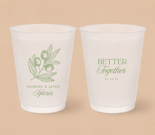 White frosted wedding cups featuring elegant olive branch artwork, custom couple names Yasmine and Javen Iglesia, Better Together design, and wedding date.