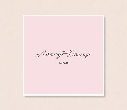 Personalized minimalist cocktail napkins featuring handwritten couple names connected by a heart and custom wedding date.