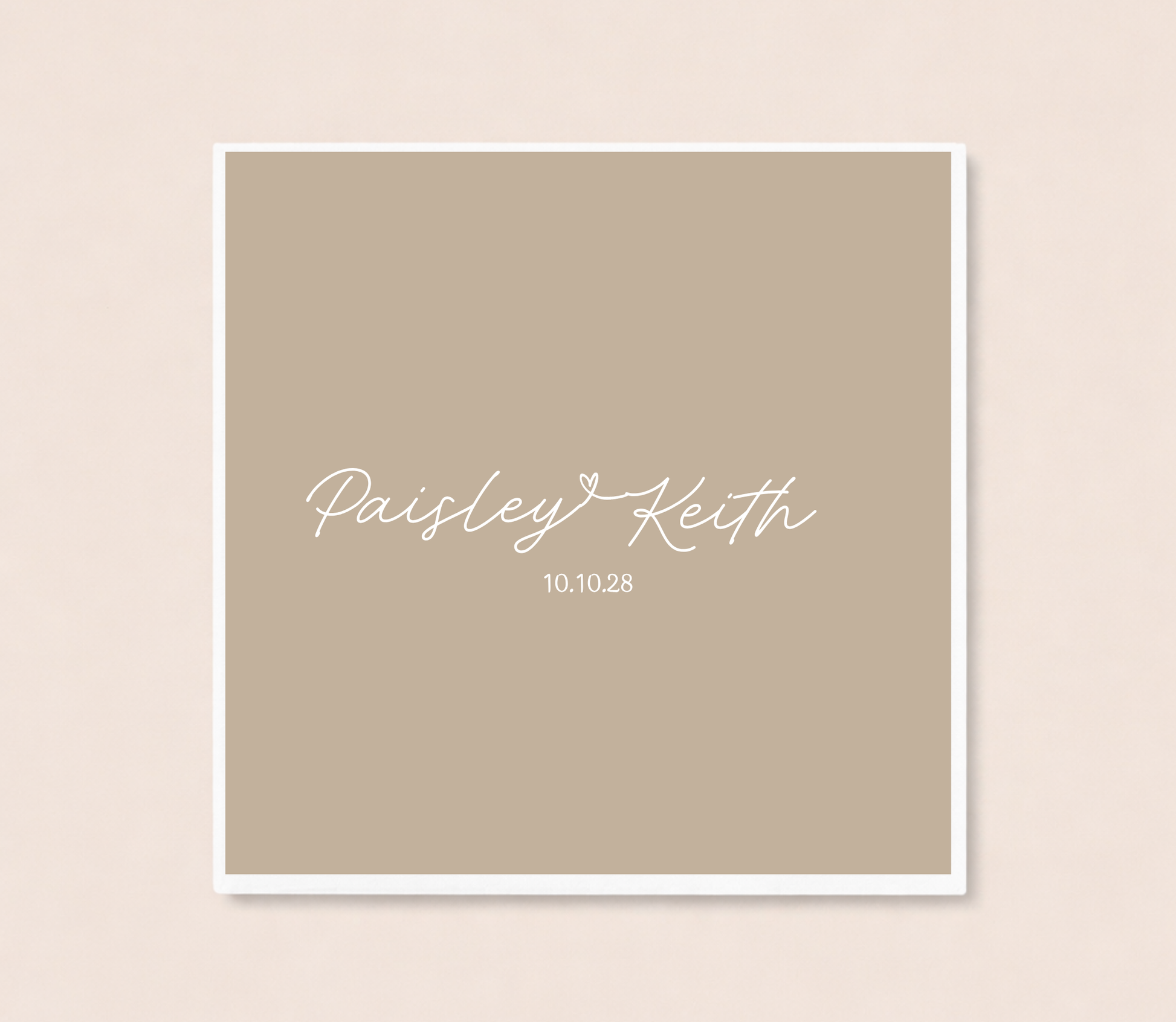 Personalized minimalist wedding cocktail napkins featuring handwritten couple names connected by a heart and custom wedding date.