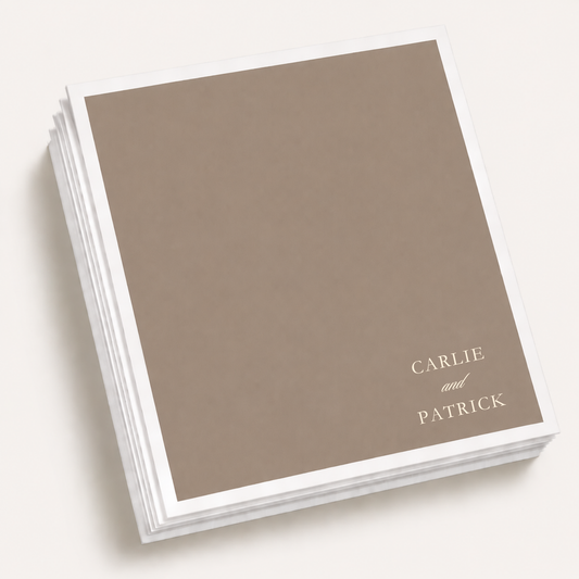 Personalized minimalist wedding cocktail napkins featuring custom couple names in an elegant modern typography design.