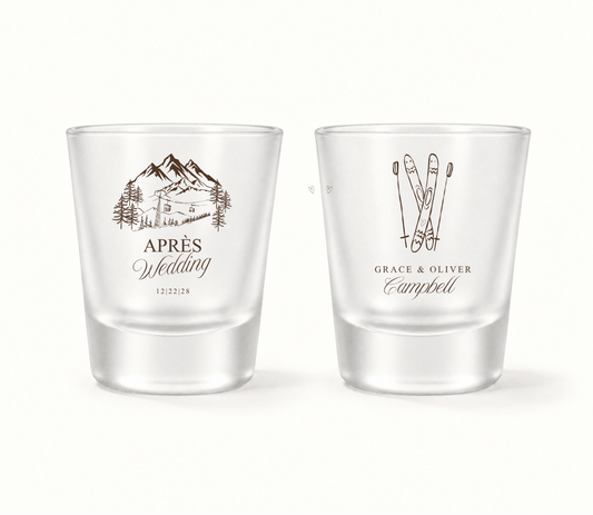 Personalized Après Wedding ski shot glasses featuring mountain resort artwork, crossed skis, custom couple names, and wedding date.

