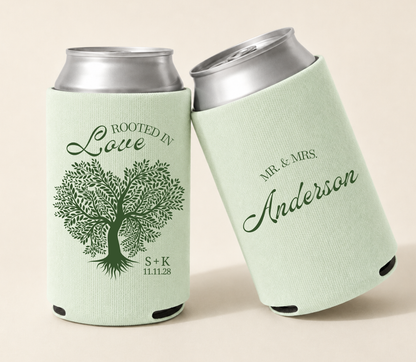 Mint green personalized wedding can coolers featuring a symbolic tree of love illustration, custom family name Anderson, couple initials, and wedding date.
